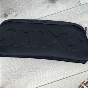 SKIMS carrying case